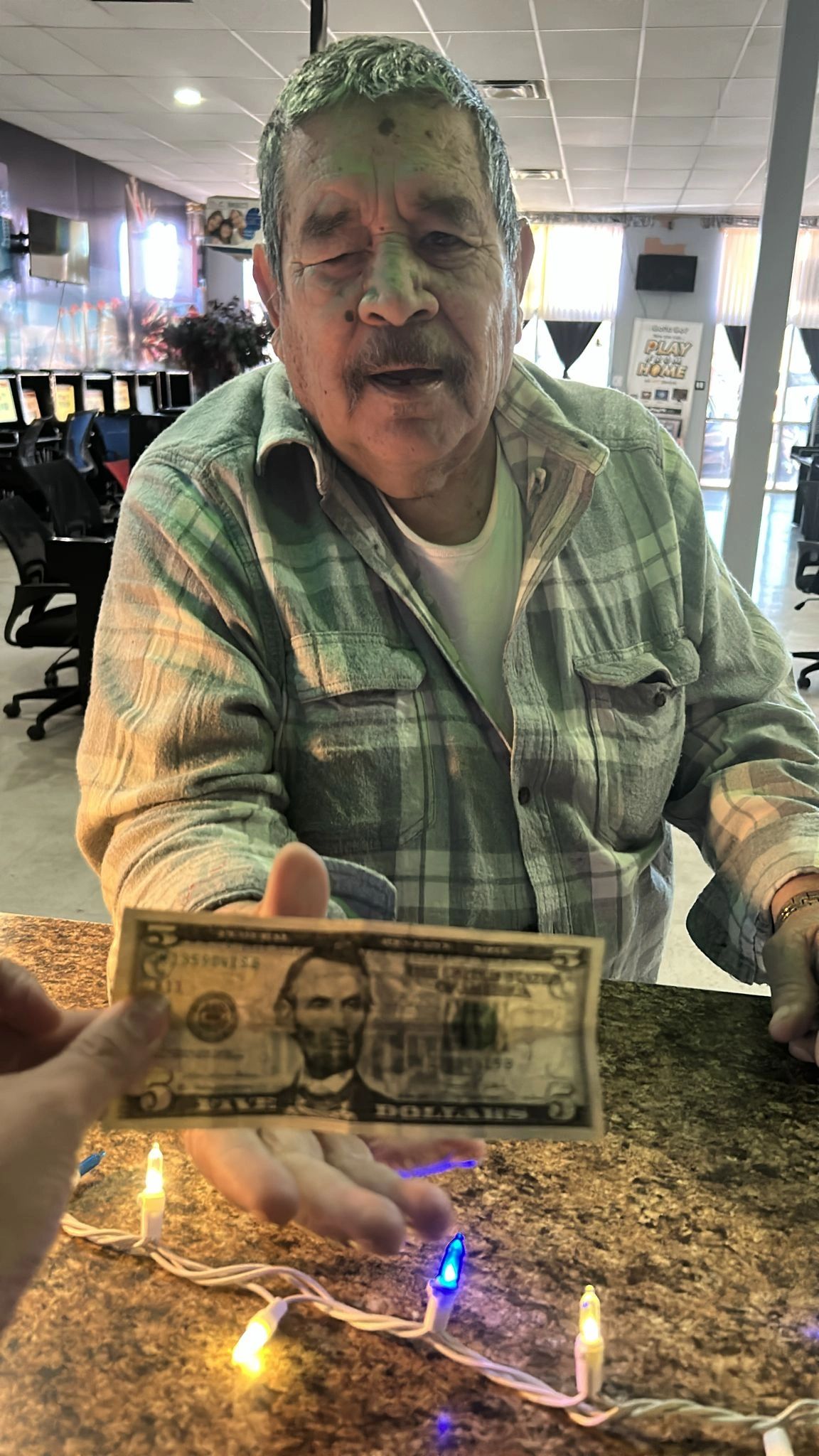 Guests celebrating and playing sweepstakes games at Northeast TelConnect community night — casino-style fun near El Paso TX