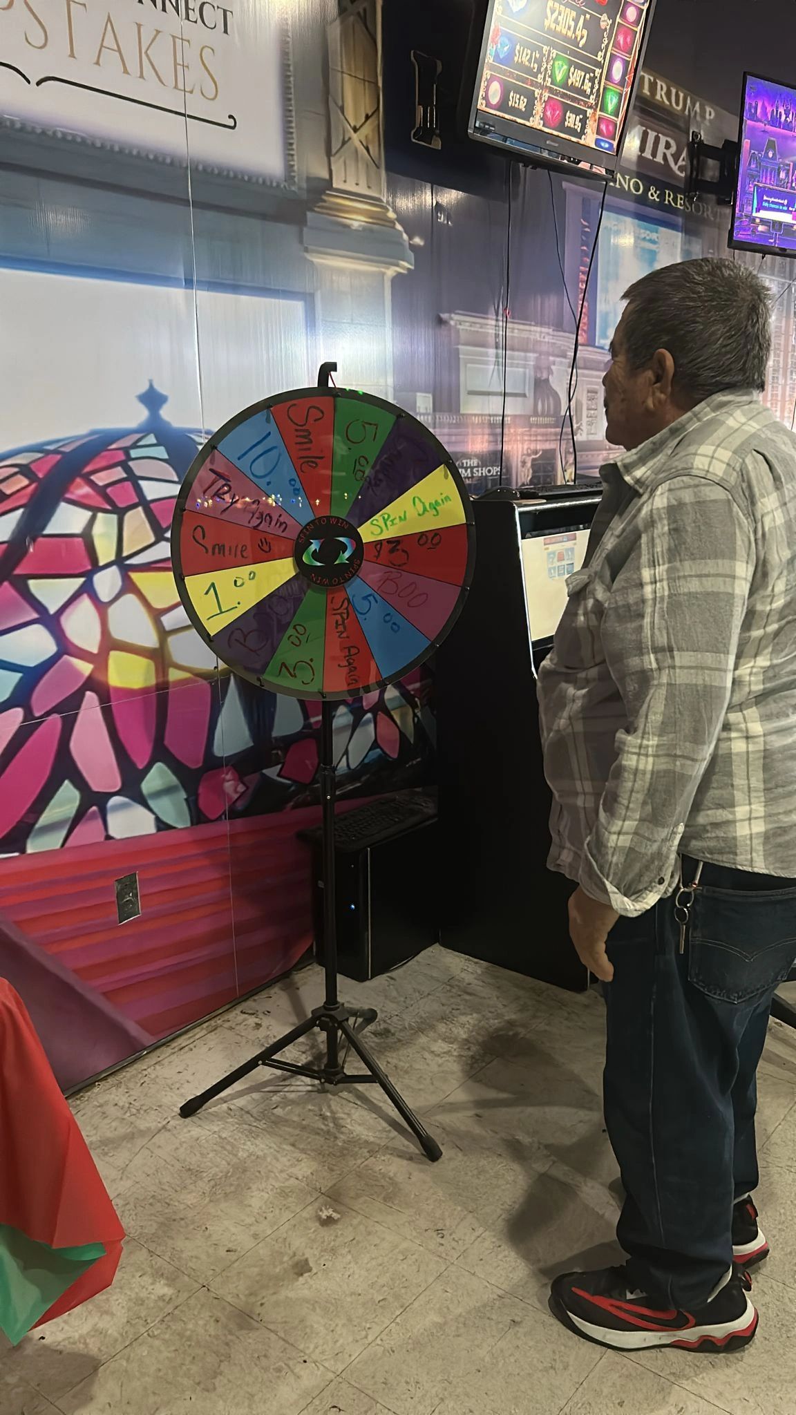 Lively event atmosphere inside Northeast TelConnect Sweepstakes with players at gaming machines — El Paso TX sweepstakes entertainment